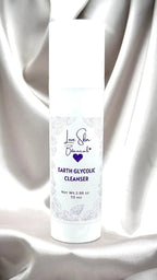 Earth Renewal Cleanser with Glycolic Acid bottle — exfoliating brightening face wash for smoother, clearer skin.